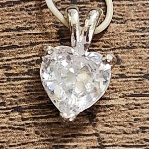 Elegant Silvertone And Glass Heart Pendant